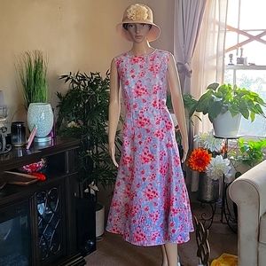 Calf length Aline dress. Vibrant rose print. Fully lined